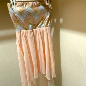 Strapless hi-low dress.